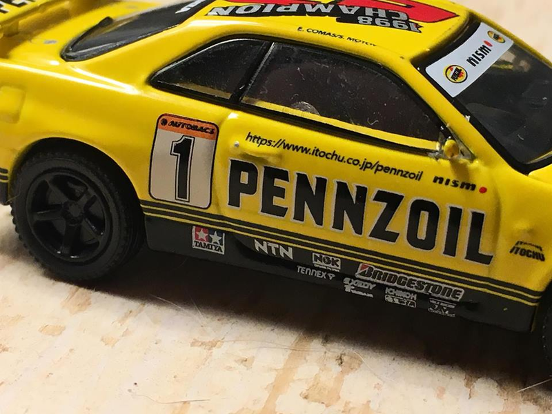 Illustration for article titled 1999 Nissan PENNZOIL NISMO GT-R by Greenlight/Tarmac Works